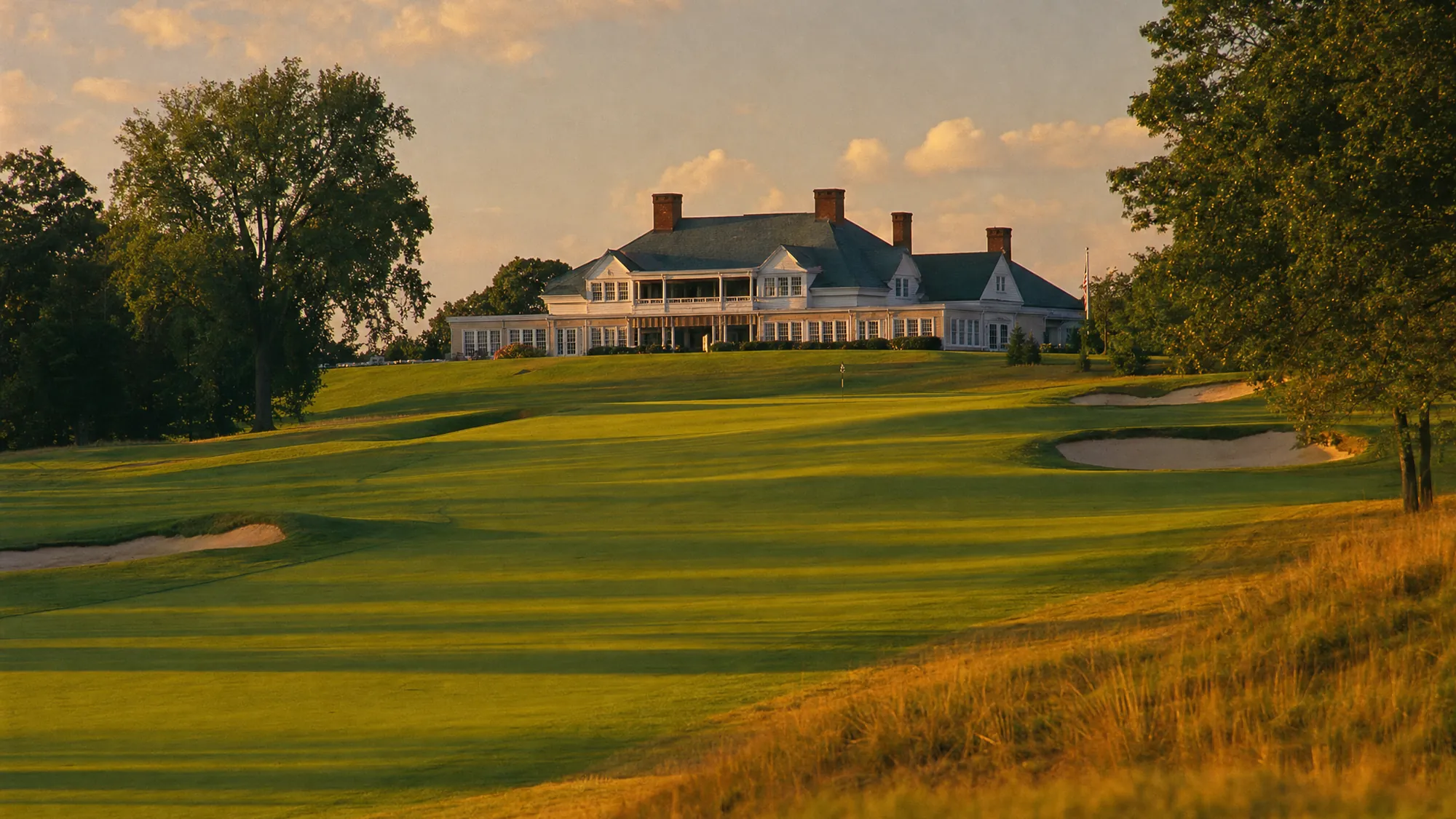 The eighteenth fairway running up to the Glenvale clubhouse in evening light